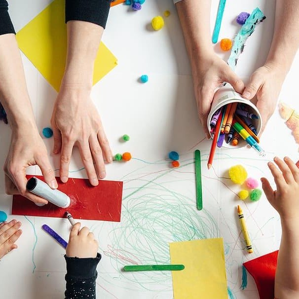 Children and adults creating together